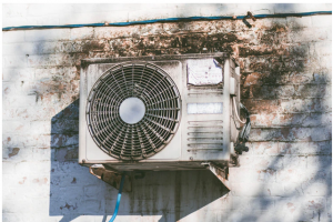 dust and remove debris from the outdoor ac unit